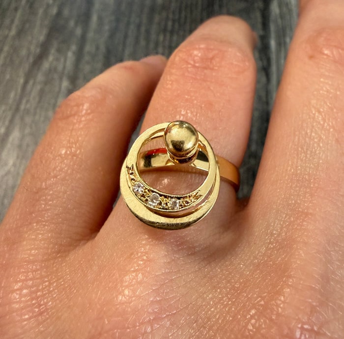Vintage Diamond Oval Spinner Ring in 14K Gold: Unique 14K gold spinner ring with an oval diamond-set center.