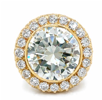 18K Yellow Gold GIA Certified 10.01 Ct. Diamond Ring: An investment-grade piece featuring a GIA Certified 10.01 carat center diamond. Set in a classic 18K yellow gold mounting.