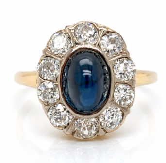 Antique 18K Yellow Gold 2.25 Ct. Sapphire & Diamond Ring: A genuine Antique ring featuring a 2.25 carat sapphire flanked by diamonds in a period-correct 18K yellow gold setting.