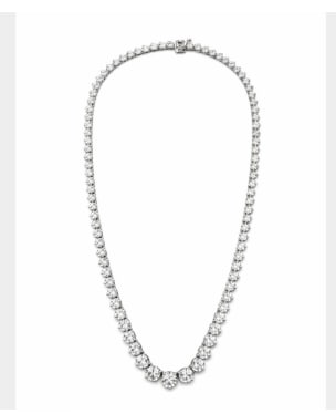 14K White Gold 28.05 Ct. Graduated Diamond Tennis Necklace: A substantial 14K white gold necklace featuring a graduated line of diamonds totaling 28.05 carats.