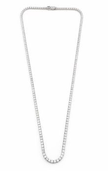 14K White Gold 6.80 Ct. Diamond Tennis Necklace: A classic diamond tennis necklace in 14K white gold featuring 6.80 carats of uniform diamonds.
