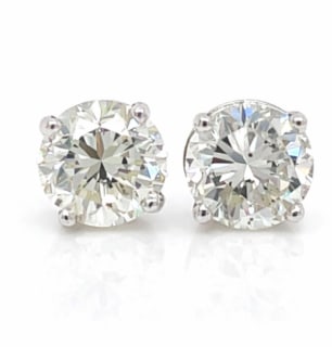 14K White Gold 2.01 Ct. Diamond Stud Earrings: Timeless 14K white gold stud earrings featuring a total diamond weight of 2.01 carats.