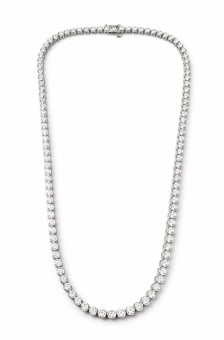 14K White Gold 7.50 Ct. Diamond Tennis Necklace: A 14K white gold necklace featuring 7.50 carats of diamonds in a classic tennis-style link.