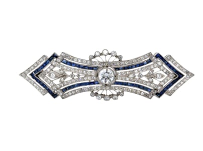 Art Deco Platinum Diamond & Sapphire Brooch: Platinum; Art Deco era design with Diamonds and Sapphires.