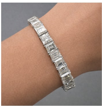 Art Deco Platinum Graduated 36.00 Ct. Diamond Tennis Bracelet: Platinum; Art Deco design with 36.00 Ct. of Graduated Diamonds.