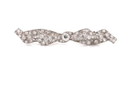 Art Deco Platinum 5.20 Ct. Diamond Brooch: Platinum; Art Deco era featuring 5.20 Ct. of Diamonds.