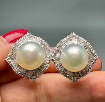 18K White Gold South Sea Pearl & Diamond Earrings: 18K White Gold; South Sea Pearls accented with Diamonds.