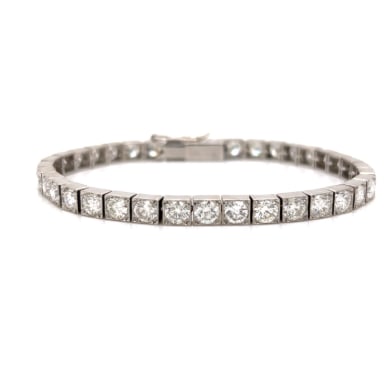 Platinum 12.00 Ct. Diamond Tennis Bracelet: Platinum; classic tennis bracelet with 12.00 Ct. of Diamonds.