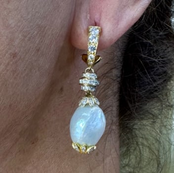 18K Yellow Gold South Sea Pearl & Diamond Earrings: 18K Yellow Gold; South Sea Pearls accented with Diamonds.
