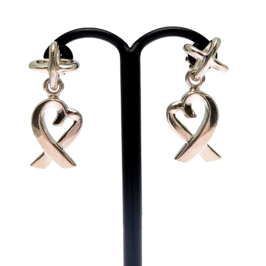Tiffany & Co. Loving Heart Women's Earrings, Sterling Silver 925: --- Catalog ---Category: SizeSize (HxWxD): 25.10mm x 10.00mm / 0.99'' x 0.39''Category: DesignType: Stud earringsGender: WomenMaterial: Silver 925Category: GeneralBrand: Tiffany--- Item List ---Sectio
