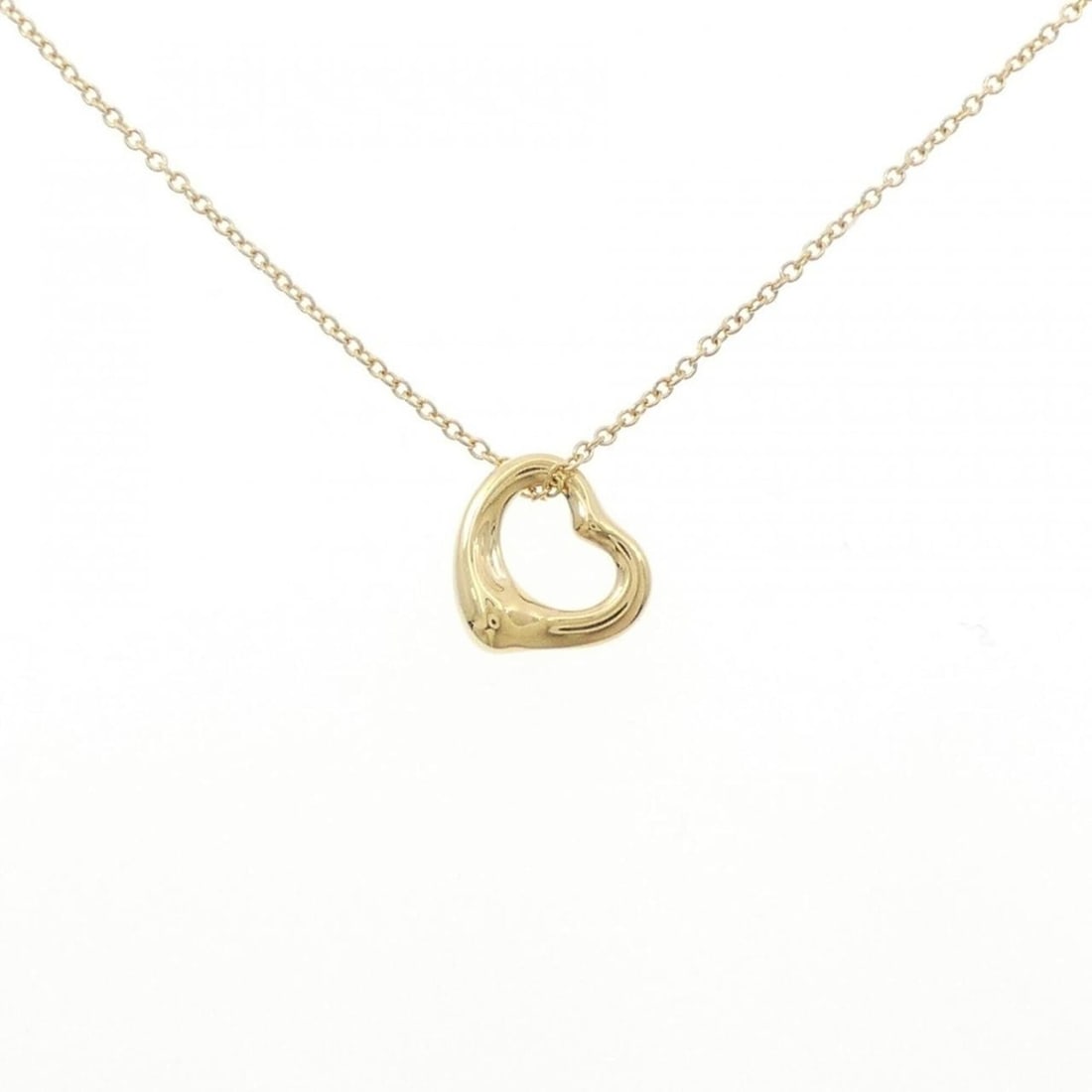 Tiffany Open Heart Necklace: --- Catalog ---Category: SizePendant Size: 11mm x 10.8mm / 0.43'' x 0.42''Neck Circumference: 42 cm / 16.53''Category: DesignColor: Yellow goldGender: WomenMaterial: Yellow goldPendant Type: