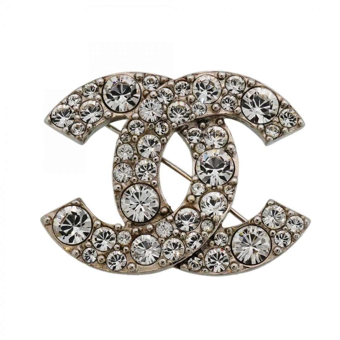 Chanel Brooch, Coco Mark, Metal, Rhinestone, Silver, Women's, OP000661: --- Catalog ---Category: SizeSize (HxWxD): 3.53cm x 4.52cm / 1.38'' x 1.77''Category: DesignType: BroochColor: SilverGender: WomenMaterial: Metal, RhinestoneCategory: GeneralBrand: Chanel--- Item List