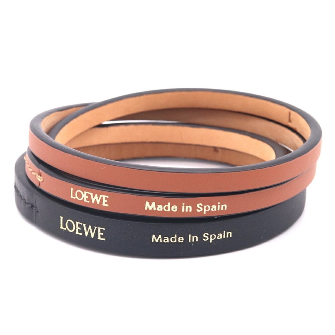 Loewe Bracelet J242240X42 Black Brown Leather L Size Bangle Set of 2 Double Women's LOEWE: --- Catalog ---Category: SizeWidth: 9mm / 0.35''Length: 19.5cm / 7.67''Category: DesignType: Charm braceletColor: Black, BrownGender: WomenMaterial: LeatherCategory: GeneralBrand: LoeweCountry of Orig
