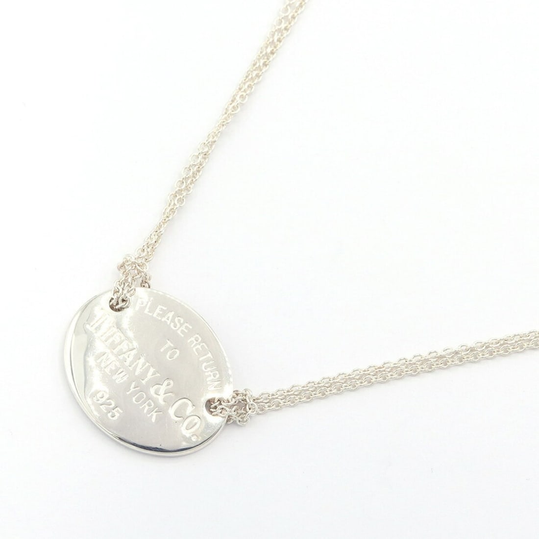 Tiffany & Co. Return to Oval Tag Necklace, Sterling Silver 925 (RTT), Double Chain Pendant, Women's: --- Catalog ---Category: SizeWeight: 7.2g / 0.25oz.Pendant Size: 18mm x 22mm / 0.7'' x 0.86''Neck Circumference: 44 cm / 17.32''Category: DesignGender: WomenMaterial: Sterling silver 925Pendant Type: 