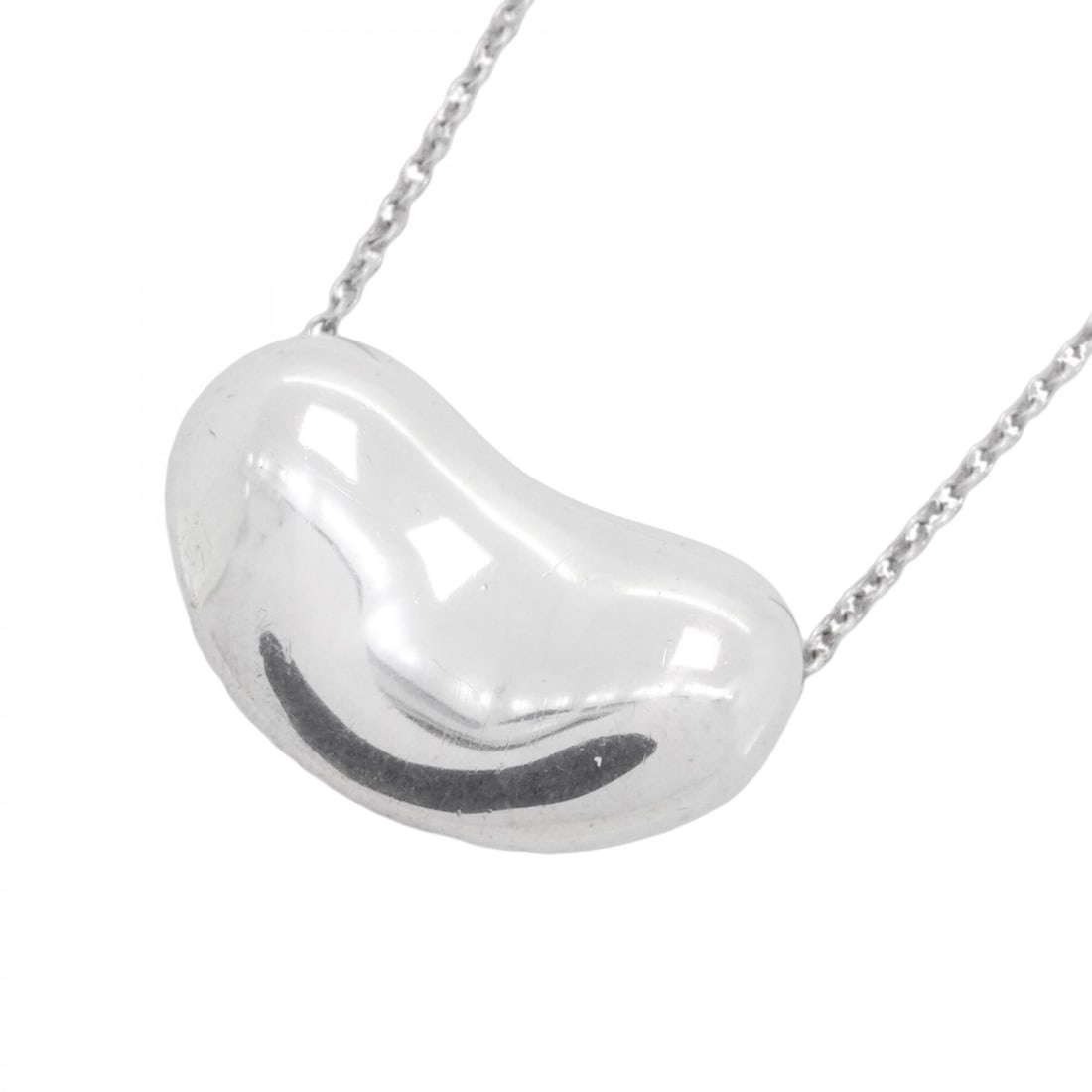 Tiffany & Co. Bean Necklace, Sterling Silver 925, Women's: --- Catalog ---Category: SizePendant Size: 12.1mm x 19.3mm / 0.47'' x 0.75''Neck Circumference: 42 cm / 16.53''Category: DesignGender: WomenMaterial: Silver 925Necklace Type: NecklaceCategory: