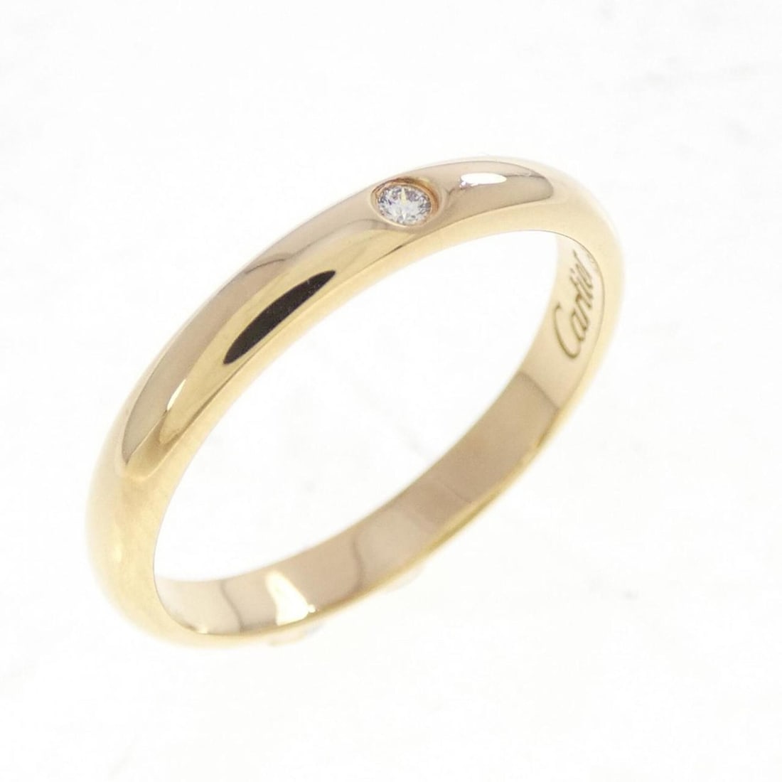 Cartier 1895 Wedding Ring: --- Catalog ---Category: SizeUS Size: 4Brand Size: 47Category: DesignType: Band ringStone: DiamondGender: WomenMaterial: Yellow gold (18K)Category: GeneralMPN: B4057600Brand: Cartier--- Item List