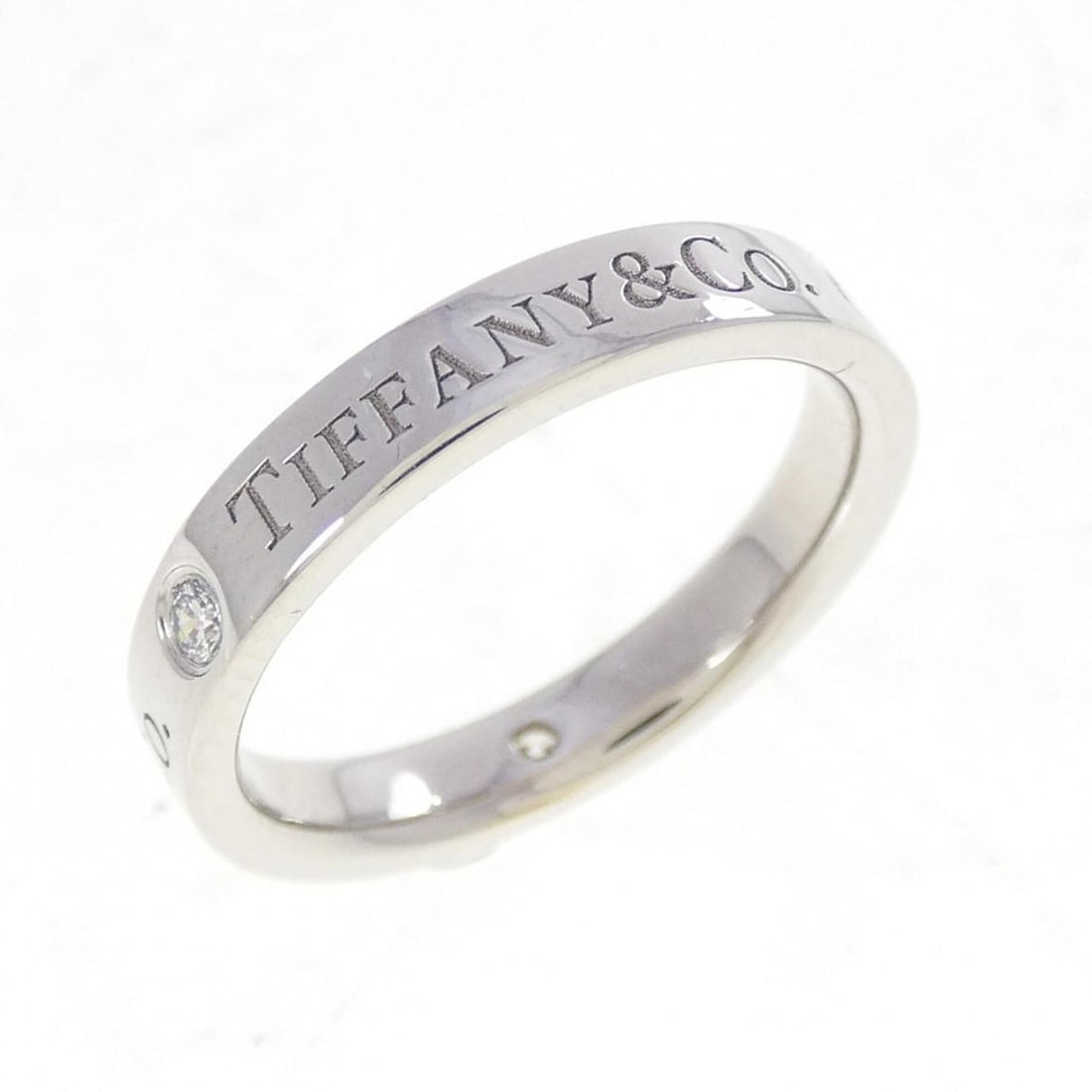 Tiffany Band Ring: --- Catalog ---Category: SizeJP Size: 7.5US Size: 4Category: DesignType: Band ringStone: DiamondGender: WomenMaterial: Platinum 950Category: GeneralBrand: Tiffany--- Item List ---Section: