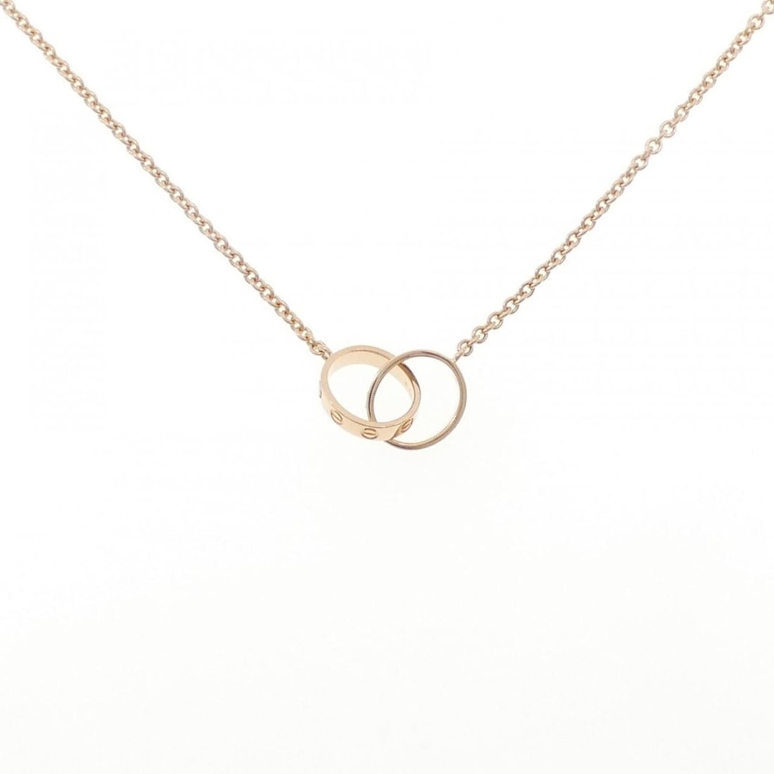 Cartier Baby Love Necklace: --- Catalog ---Category: SizePendant Size: 10mm x 19.2mm / 0.39'' x 0.75''Neck Circumference: 44 cm / 17.32''Category: DesignGender: WomenMaterial: Pink gold (18K)Pendant Type: PendantNecklace Type: