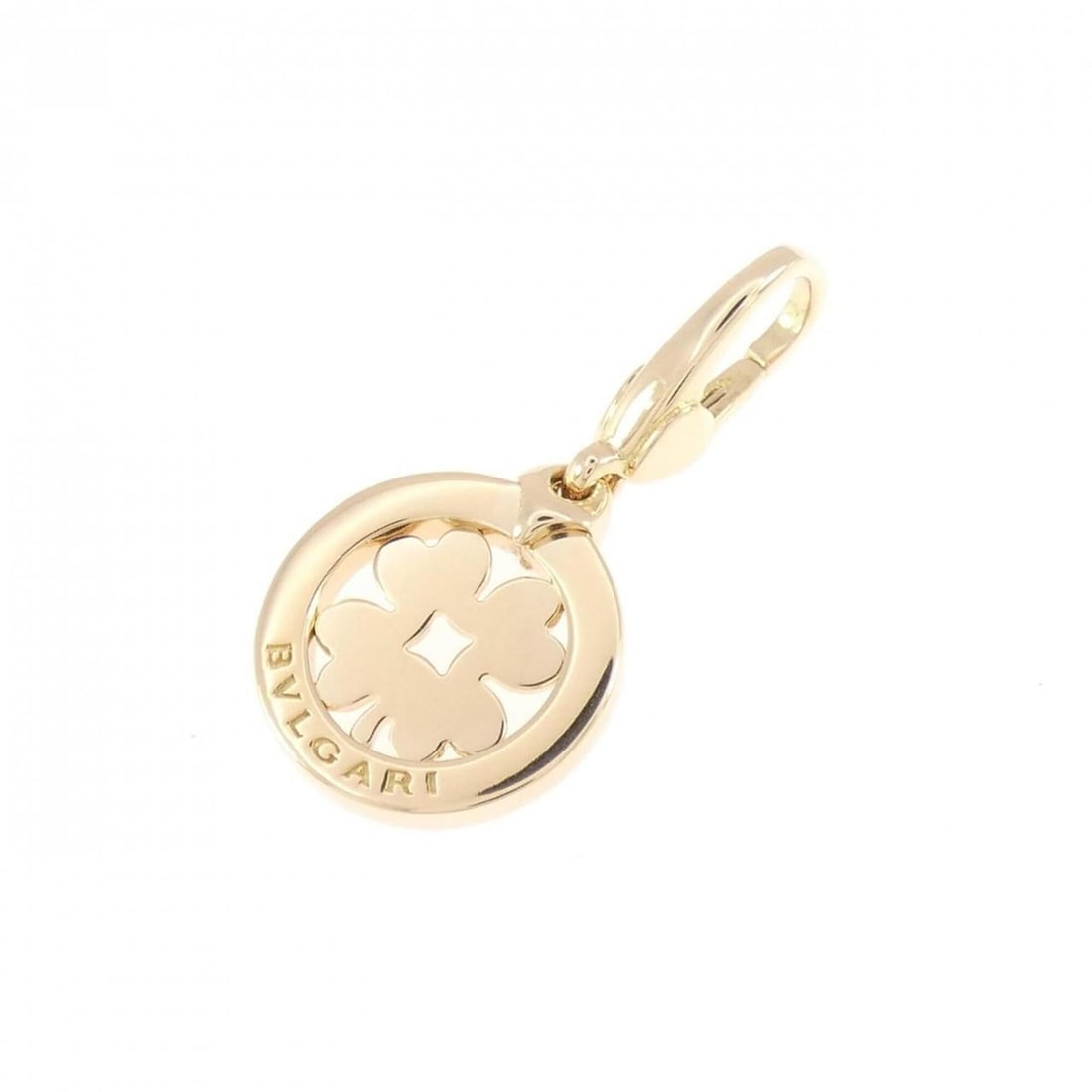 Bvlgari Tondo Clover Charm: --- Catalog ---Category: SizeSize (HxWxD): 29.10mm x 14.30mm / 1.15'' x 0.56''Category: DesignType: Necklace charmGender: WomenMaterial: Yellow gold (18K)Category: GeneralBrand: Bvlgari--- Item List