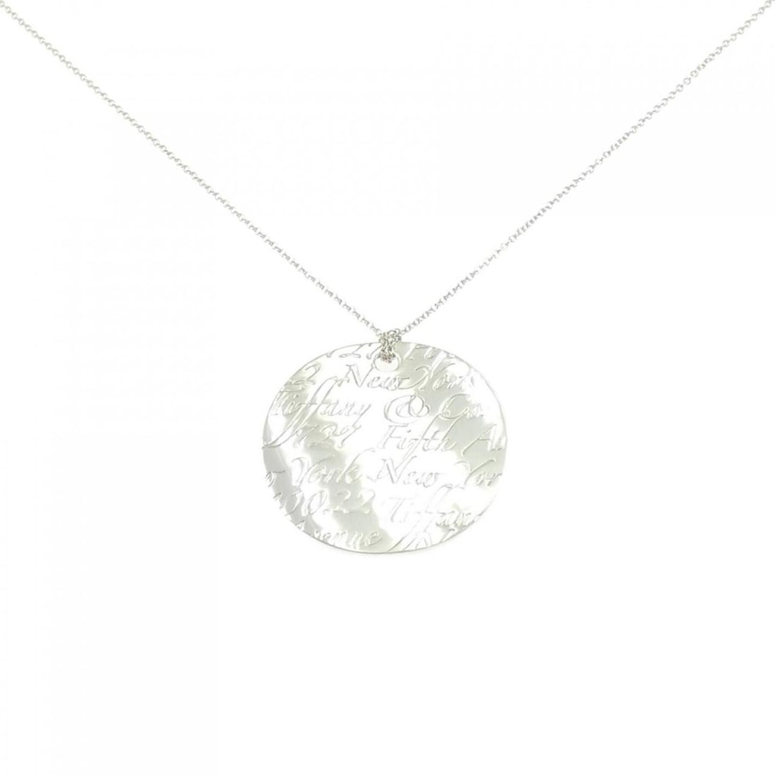 Tiffany Notes Round Large Necklace: --- Catalog ---Category: SizePendant Size: 40.7mm / 1.6''Neck Circumference: 46 cm / 18.11''Category: DesignGender: WomenMaterial: Silver 925Necklace Type: NecklaceCategory: GeneralBrand: Tiffany---