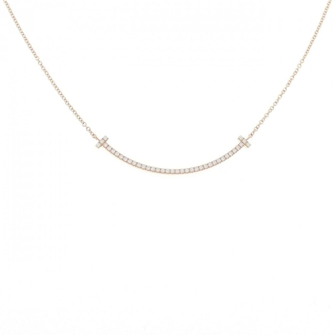 Tiffany T Smile Small Necklace: --- Catalog ---Category: SizePendant Size: 3.5mm x 37.2mm / 0.13'' x 1.46''Neck Circumference: 41 cm / 16.14''Category: DesignStone: DiamondGender: WomenMaterial: Pink gold (18K)Pendant Type:
