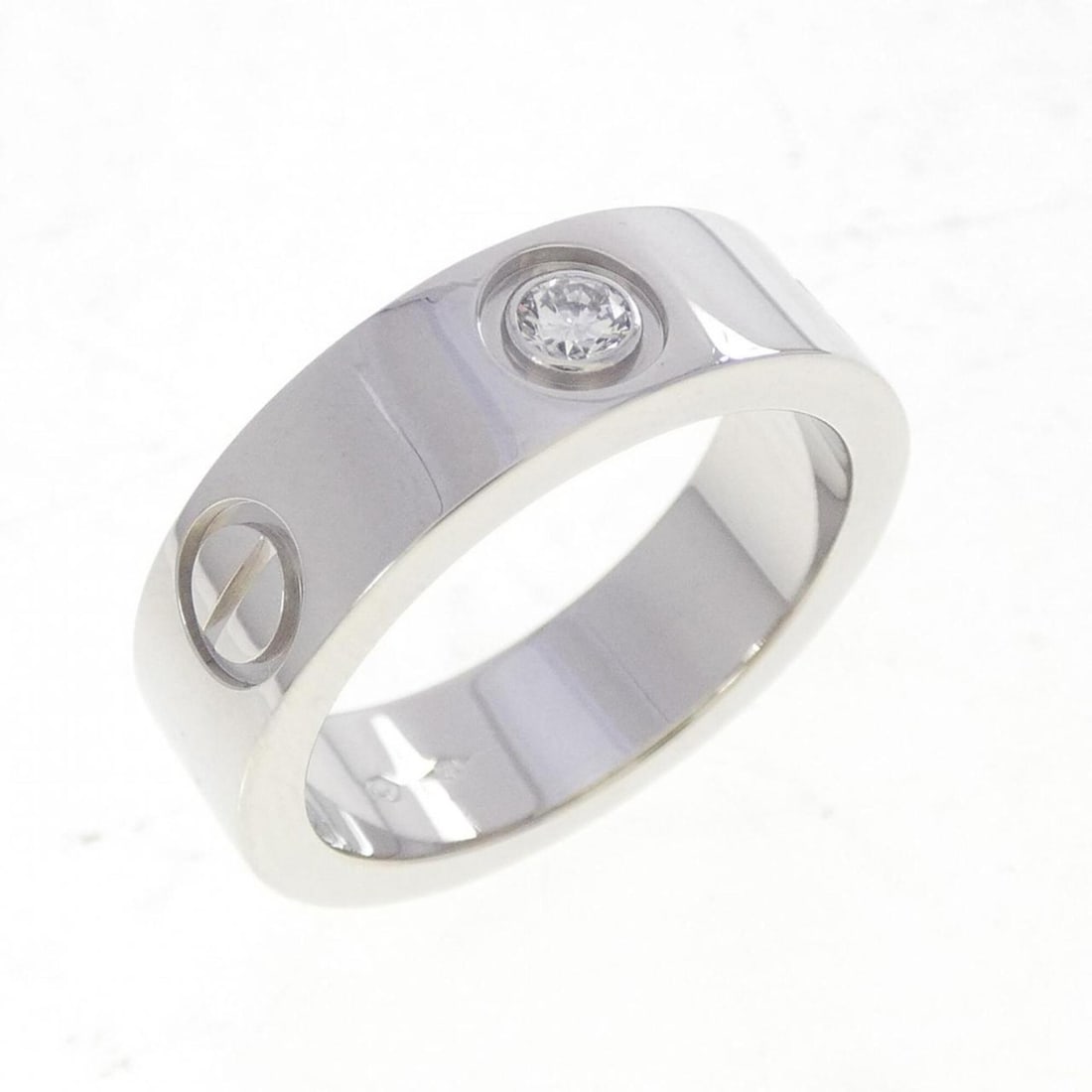 Cartier Love 1P Ring: --- Catalog ---Category: SizeUS Size: 5.5Brand Size: 50Category: DesignType: Band ringGender: WomenMaterial: Platinum 950Category: GeneralBrand: Cartier--- Item List ---Section: ConditionRanking: Rank