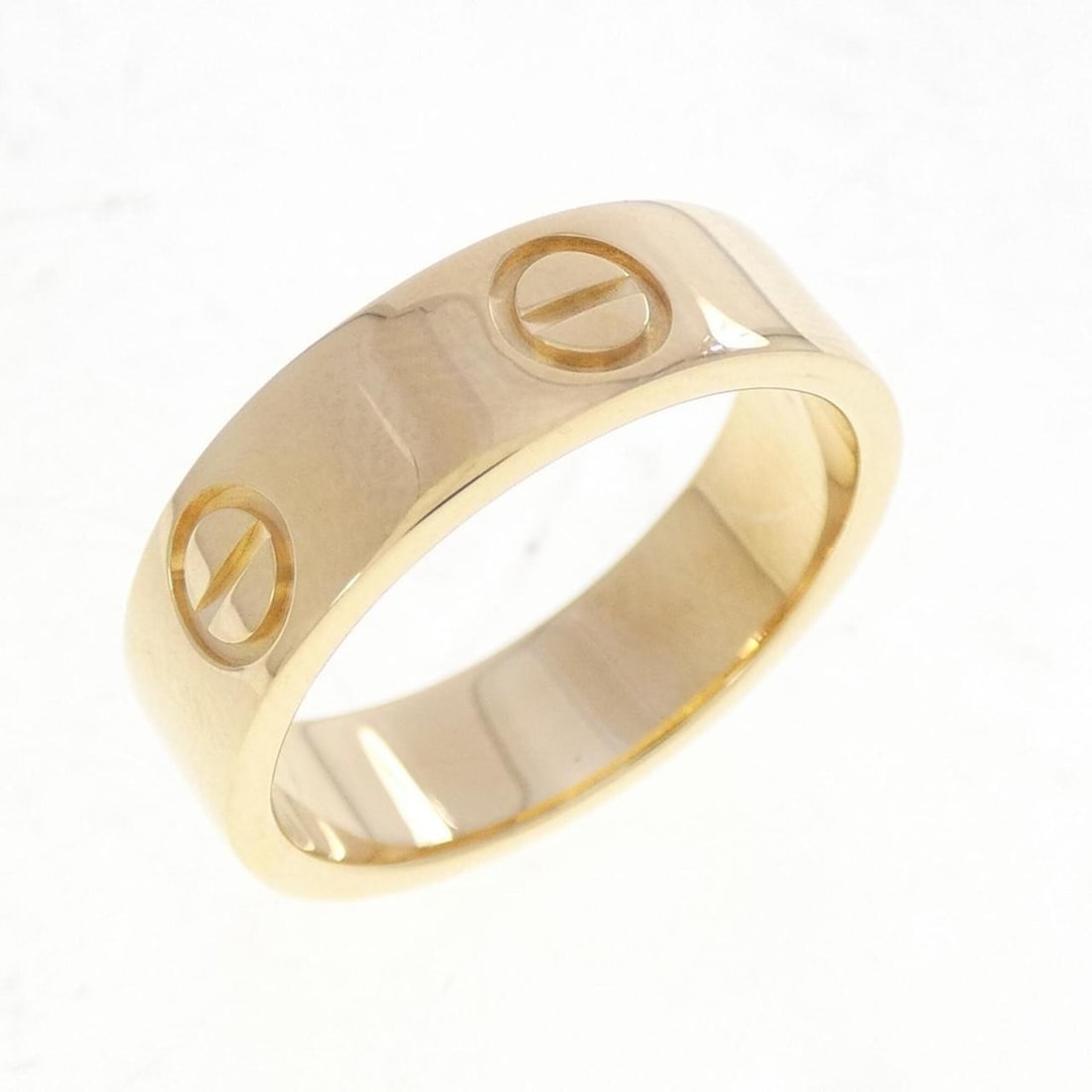 Cartier Love Ring: --- Catalog ---Category: SizeUS Size: 6.5Brand Size: 52Category: DesignType: Band ringGender: WomenMaterial: Yellow gold (18K)Category: GeneralMPN: B4084600Brand: Cartier--- Item List ---Section: Cond