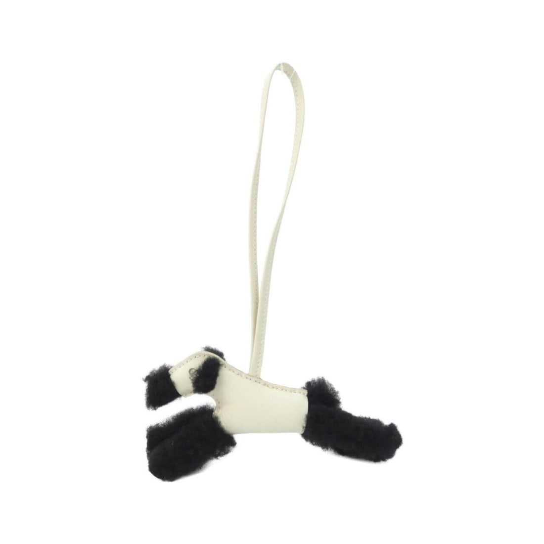 Hermes Buddy Accessory Bag Charm 083349CA: --- Catalog ---Category: SizeSize (HxWxD): 65.00mm x 150.00mm / 2.56'' x 5.91''Category: DesignType: Handbag charmColor: Black, WhiteGender: Women,MenMaterial: Agneau Milo, LeatherLeather/Fur Type:
