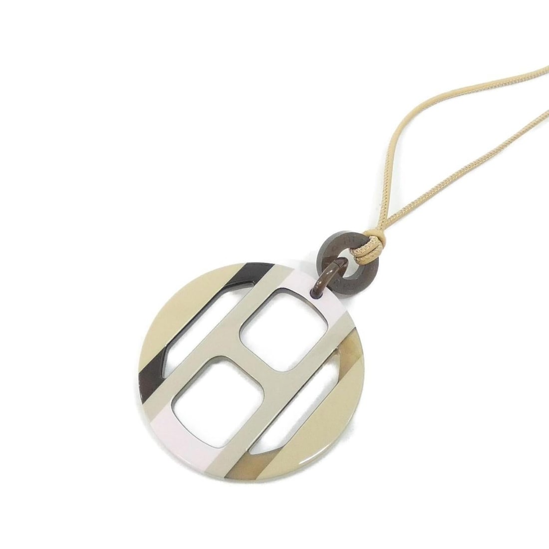 Hermes H Equipe 057087FL Necklace: --- Catalog ---Category: SizePendant Size: 85mm x 65mm / 3.34'' x 2.55''Neck Circumference: 77.5 cm / 30.51''Category: DesignGender: WomenMaterial: Buffalo hornNecklace Type: NecklaceCategory: