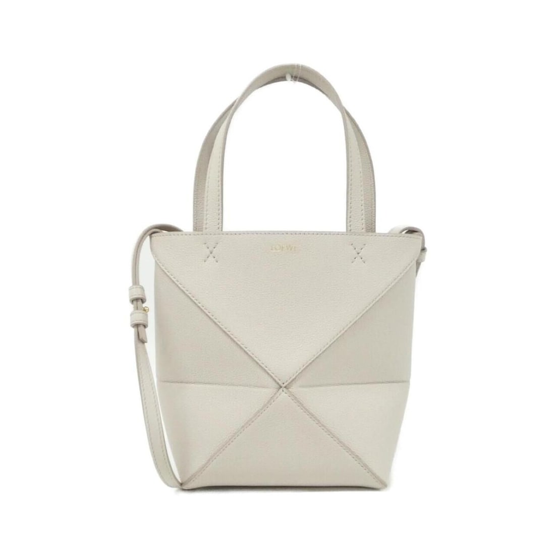Loewe Puzzle Fold Mini Tote A779V25X19 Handbag: --- Catalog ---Category: SizeSize (HxWxD): 20cm x 21cm x 9cm / 7.87'' x 8.26'' x 3.54''Category: DesignType: HandbagColor: BeigeGender: WomenMaterial: Leather Leather/Fur Type: CalfskinCategory:
