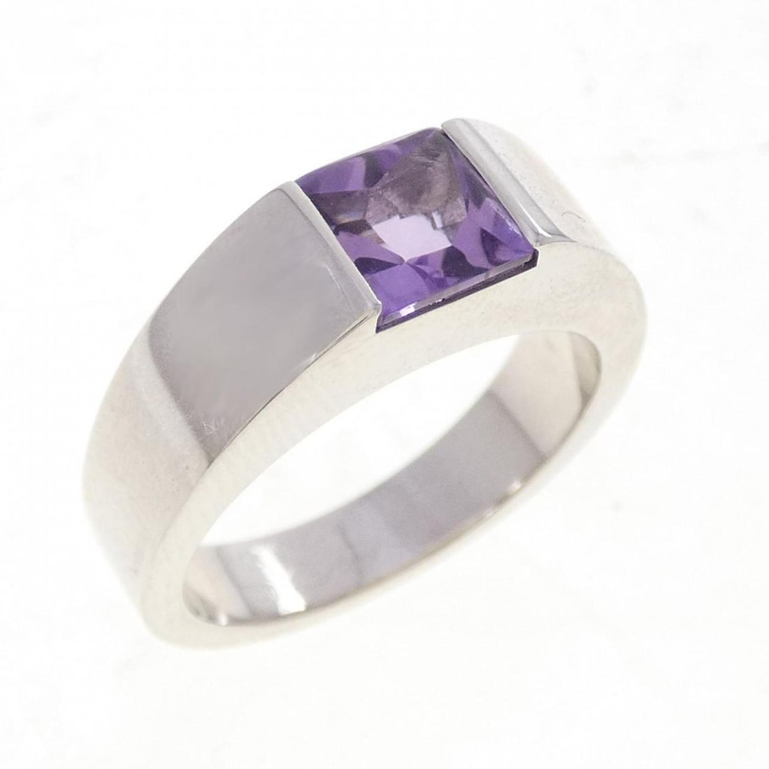 Cartier Tank Ring: --- Catalog ---Category: SizeUS Size: 6.5Brand Size: 53Category: DesignType: Band ringStone: AmethystGender: WomenMaterial: White gold (18K)Category: GeneralBrand: Cartier--- Item List ---Section: