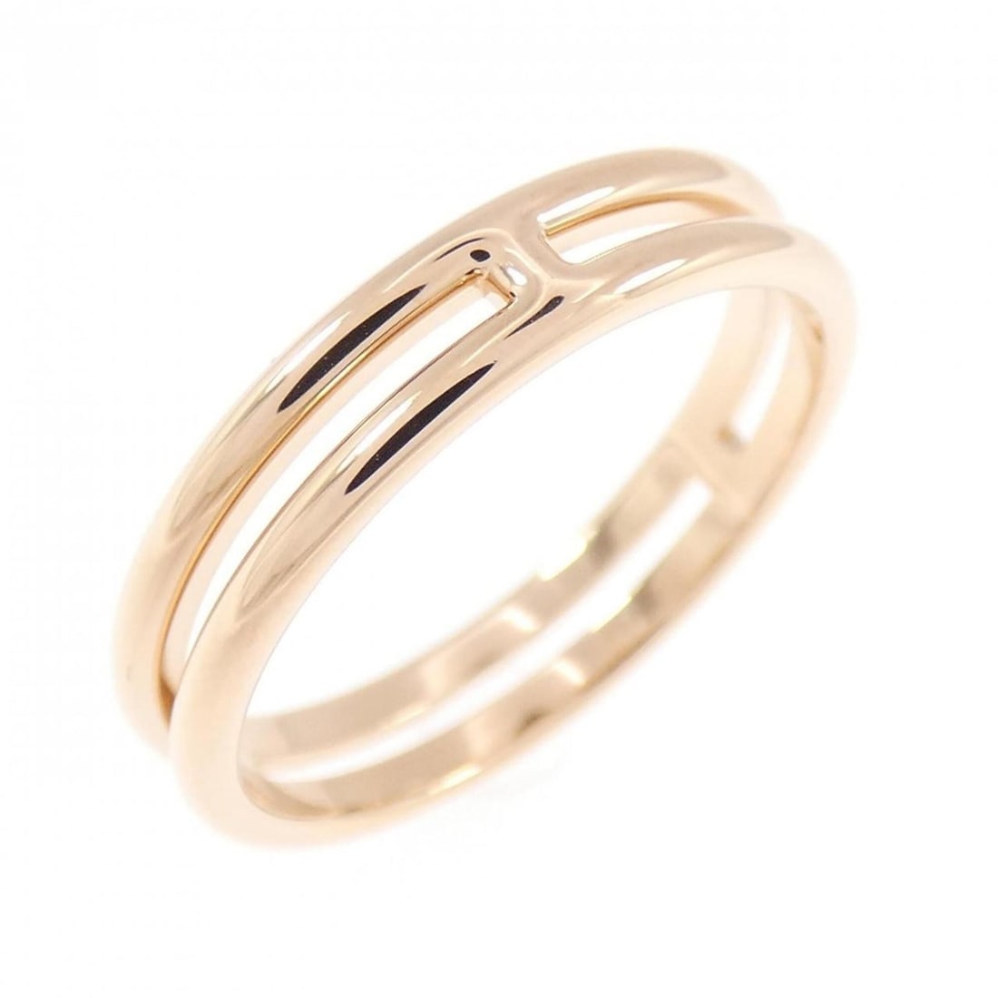 Hermes Ariane Ring: --- Catalog ---Category: SizeUS Size: 5.5Brand Size: 50Category: DesignType: Band ringGender: WomenMaterial: Pink gold (18K)Category: GeneralMPN: H119836BBrand: Hermes--- Item List ---Section: Conditi