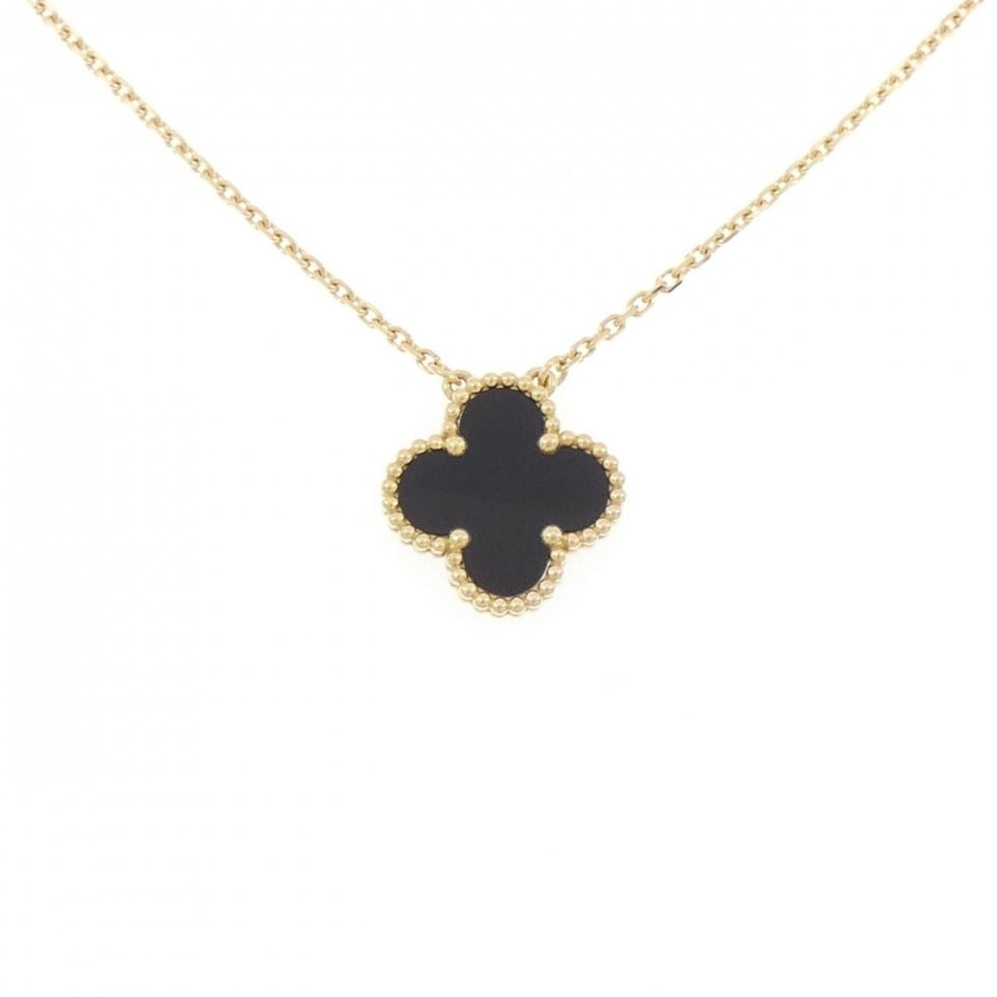 Van Cleef & Arpels Vintage Alhambra Necklace: --- Catalog ---Category: SizePendant Size: 15mm x 15mm / 0.59'' x 0.59''Neck Circumference: 38 cm - 42 cm / 14.96'' - 16.53''Category: DesignStone: OnyxGender: WomenMaterial: Yellow gold (18K)Pendant