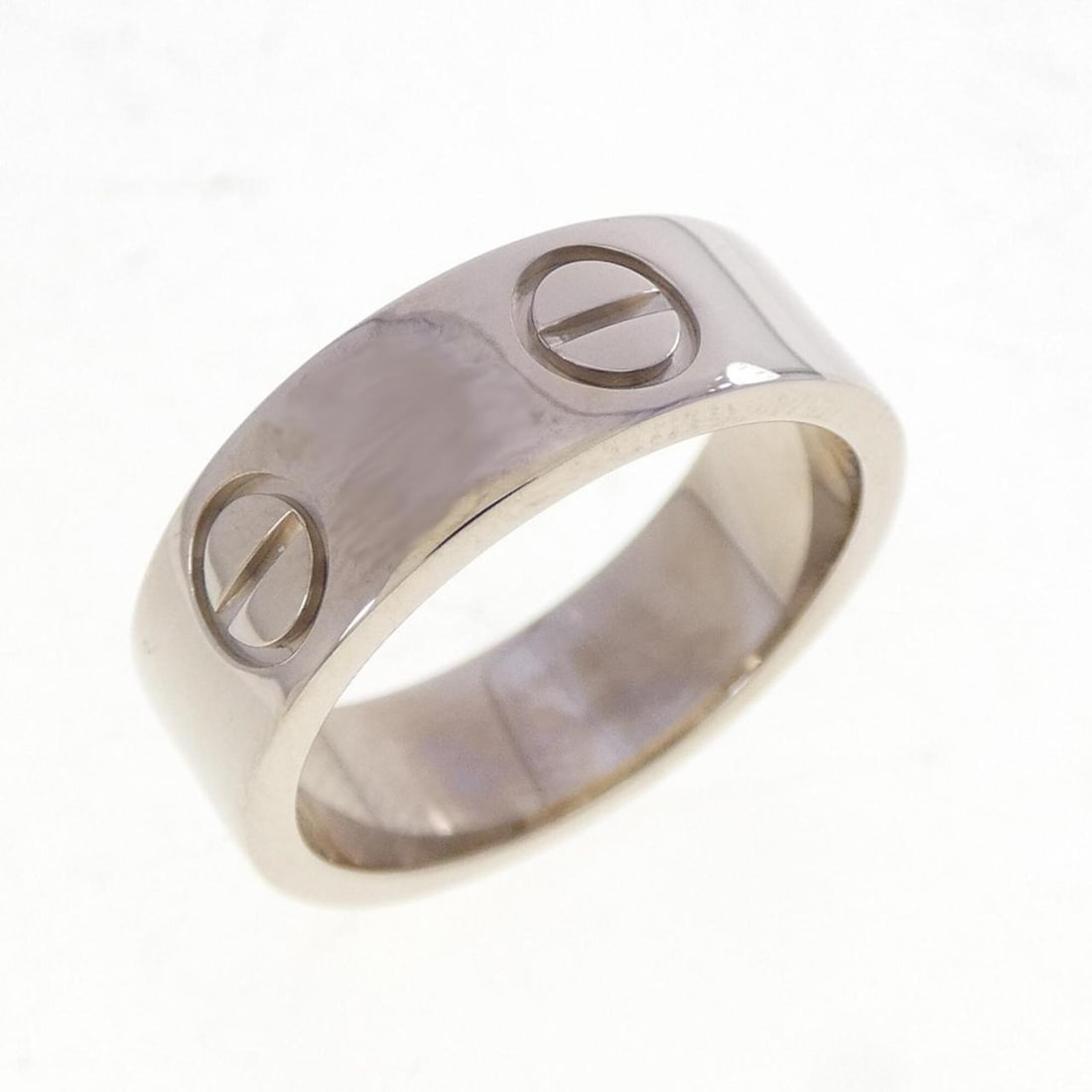 Cartier Love Ring: --- Catalog ---Category: SizeUS Size: 4Brand Size: 47Category: DesignType: Band ringGender: WomenMaterial: White gold (18K)Category: GeneralBrand: Cartier--- Item List ---Section: ConditionRanking: