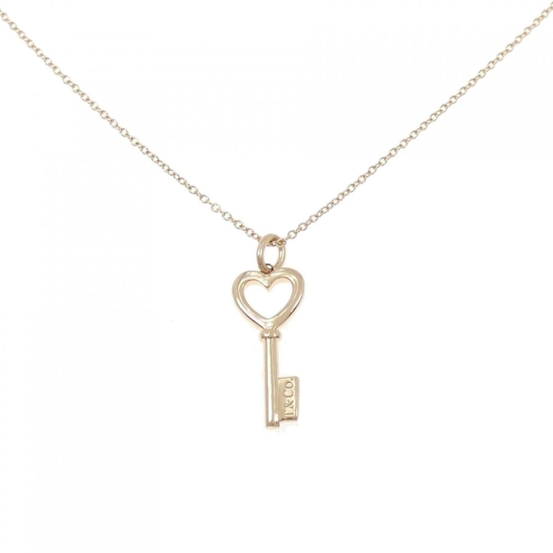 Tiffany Heart Key Necklace: --- Catalog ---Category: SizePendant Size: 22.5mm x 8.2mm / 0.88'' x 0.32''Neck Circumference: 41 cm / 16.14''Category: DesignGender: WomenMaterial: Pink gold (18K)Pendant Type: PendantNecklace Type: