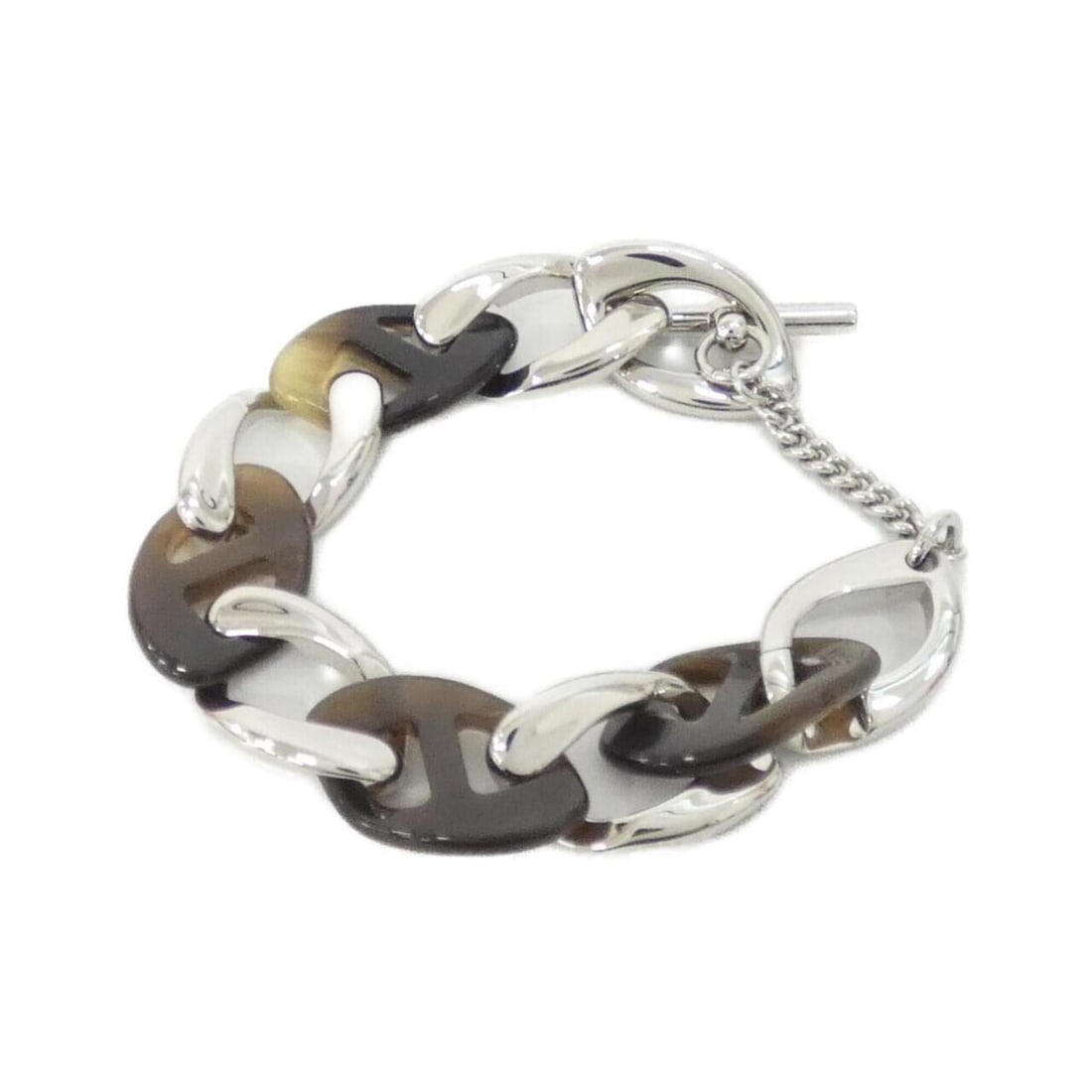 Hermes CHAINE D'H PM 100015FD Bracelet: --- Catalog ---Category: SizeLength: 19cm / 7.48''Category: DesignType: Charm braceletColor: Brown, SilverGender: WomenMaterial: Buffalo hornCategory: GeneralMPN: 100015FDBrand: Hermes--- Item List