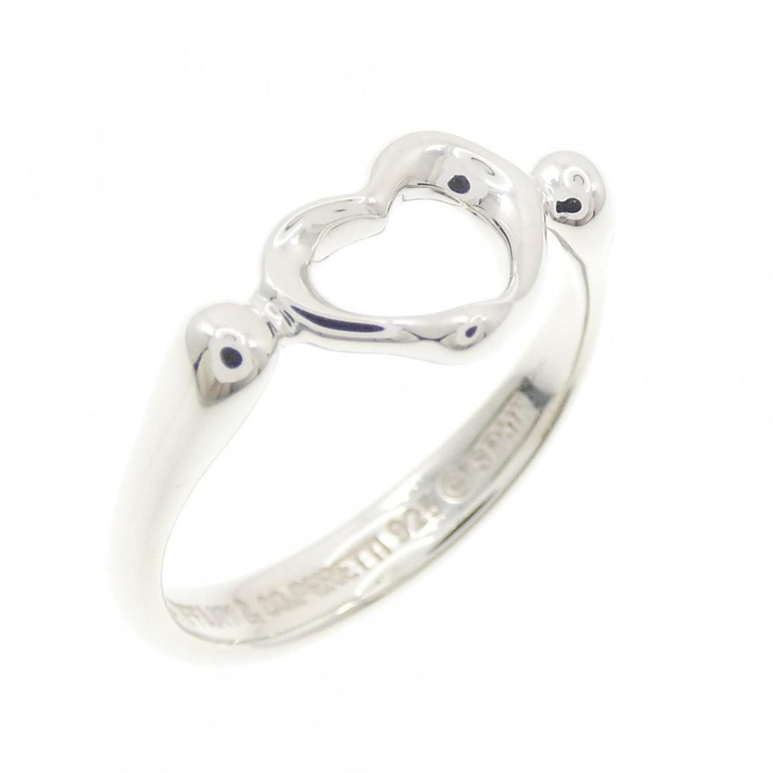 Tiffany Open Heart Ring: --- Catalog ---Category: SizeJP Size: 8.0US Size: 4.5Category: DesignType: Band ringGender: WomenMaterial: Silver 925Category: GeneralBrand: Tiffany--- Item List ---Section: ConditionRanking: Rank A