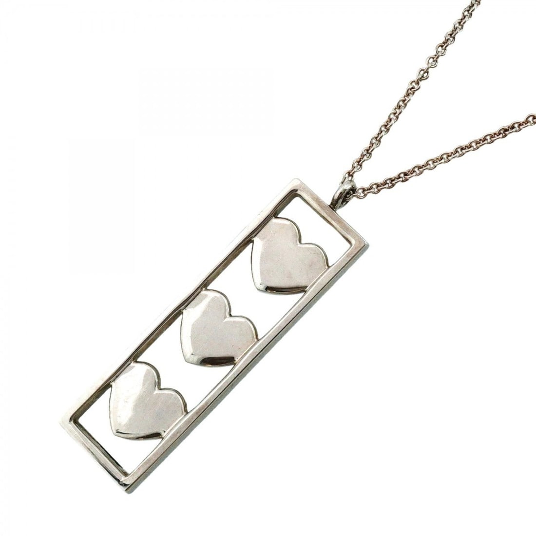 Tiffany & Co. Triple Heart Plate Necklace, Sterling Silver 925, Women's: --- Catalog ---Category: SizePendant Size: 46.1mm x 12.8mm / 1.81'' x 0.5''Neck Circumference: 41 cm / 16.14''Category: DesignGender: WomenMaterial: Silver 925Necklace Type: NecklaceCategory: GeneralB