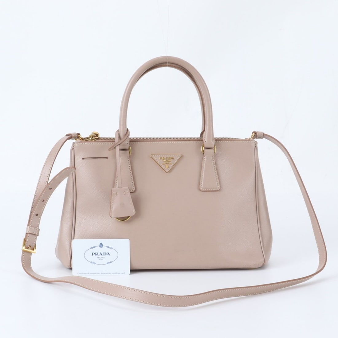 Prada Galleria 2-Way Shoulder Bag, Saffiano Leather, with Guarantee Card, for Women: --- Catalog ---Category: SizeSize (HxWxD): 20cm x 33cm x 14cm / 7.87'' x 12.99'' x 5.51''Strap Length: 105cm / 41.33''Handle Length: 34cm / 13.38''Category: DesignType: Shoulder bagColor: PinkGender: 