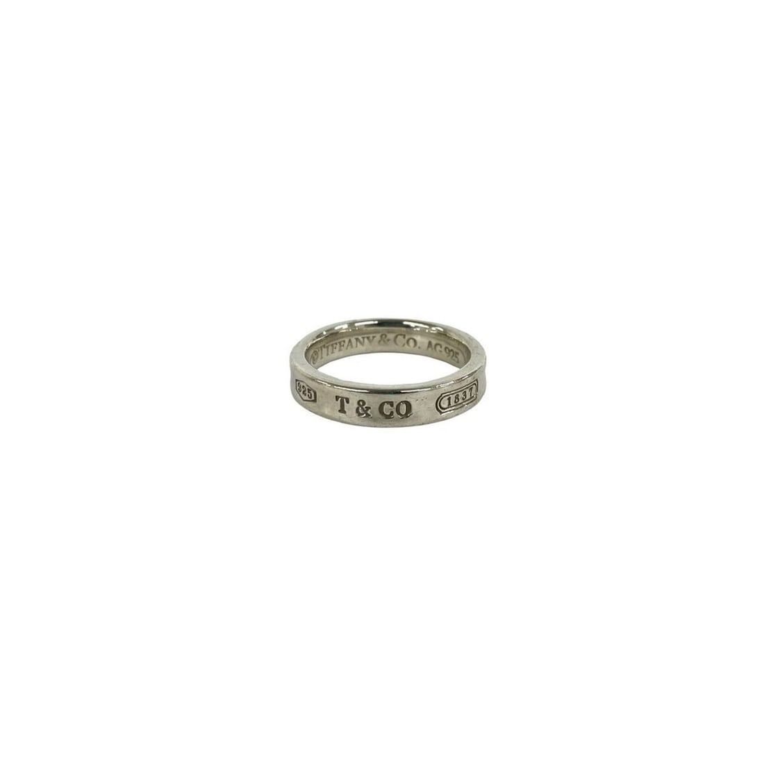 TIFFANY&Co. Tiffany Narrow Ring, Sterling Silver 925, Item Number 27872: --- Catalog ---Category: SizeJP Size: 9US Size: 5Category: DesignType: Band ringColor: SilverGender: WomenMaterial: Silver 925Category: GeneralBrand: Tiffany--- Item List ---Section: ConditionRanking: