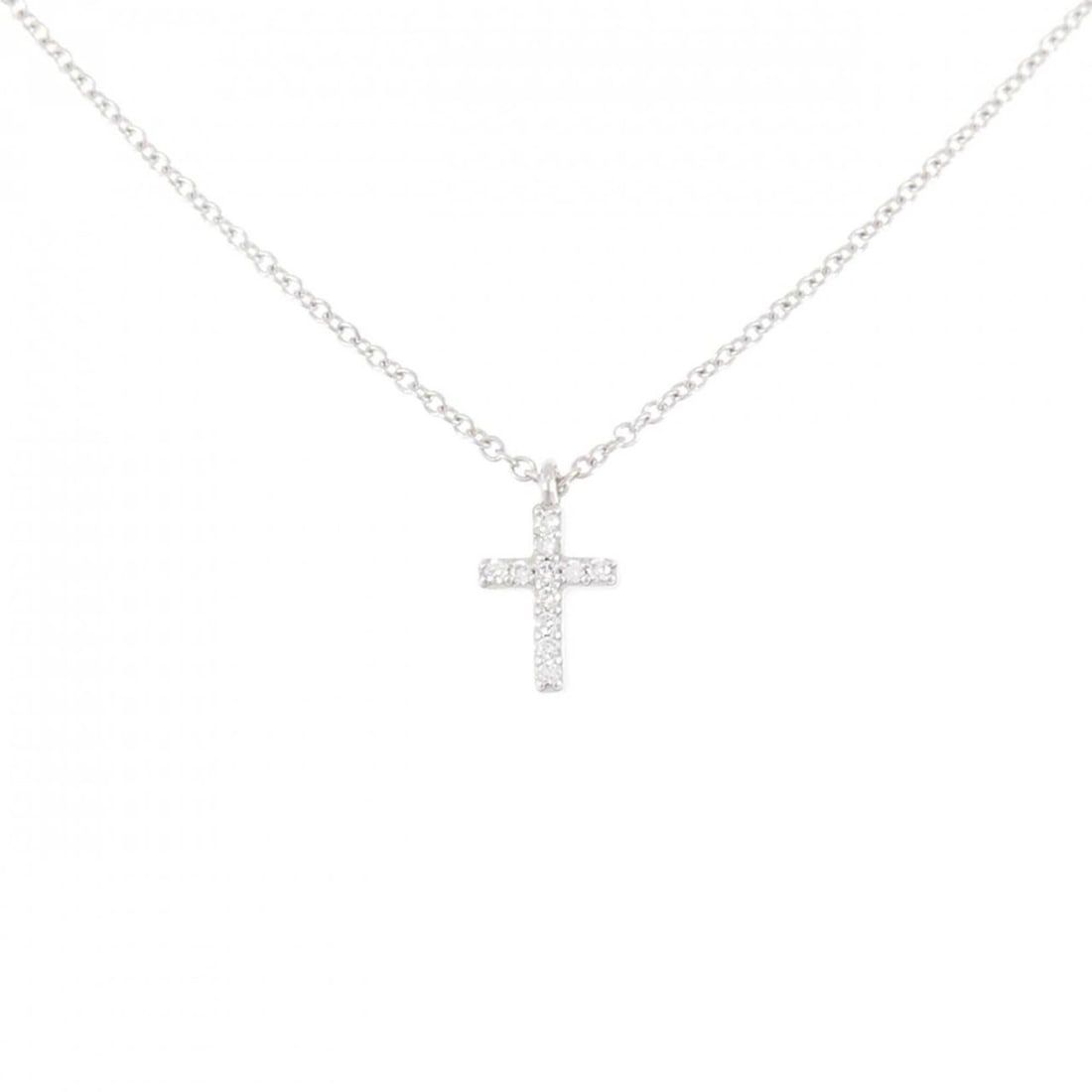 Tiffany Metro Cross Mini Necklace: --- Catalog ---Category: SizePendant Size: 9.9mm x 5.9mm / 0.38'' x 0.23''Neck Circumference: 41 cm / 16.14''Category: DesignGender: WomenMaterial: White gold (18K)Necklace Type: NecklaceCategory: