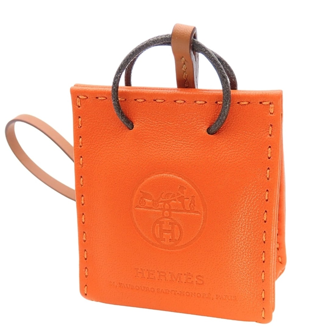 Hermes bag charm, Sac Orange, Agneau Milo, orange, Y stamp, women's.: --- Catalog ---Category: SizeWeight: 8.8g / 0.31oz.Size (HxWxD): 70.00mm x 50.00mm / 2.76'' x 1.97''Category: DesignType: Handbag charmColor: OrangeGender: WomenMaterial: Agneau MiloCategory: