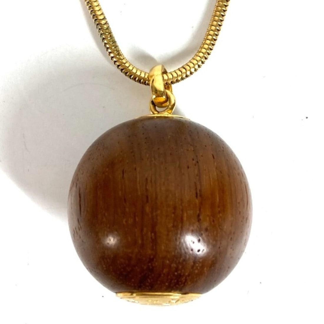 HERMES Hermes Sellier Wood Ball Chain Accessory Necklace Metal Men's Women's Gold: --- Catalog ---Category: SizeNeck Circumference: 58.5 cm / 23.03''Category: DesignColor: Brown, GoldGender: Men,WomenMaterial: Metal, WoodNecklace Type: NecklaceCategory: GeneralBrand: Hermes--- Item 