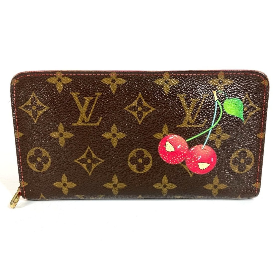 LOUIS VUITTON M95006 Monogram Cherry Porte Monnaie Zip Long Wallet (Round Zipper) - Women's, Brown: --- Catalog ---Category: SizeSize (HxWxD): 10cm x 19cm / 3.93'' x 7.48''Category: DesignType: Long wallet (bi-fold)Color: Brown, Red colorGender: WomenMaterial: Monogram Cherry Blossom Category: Gener
