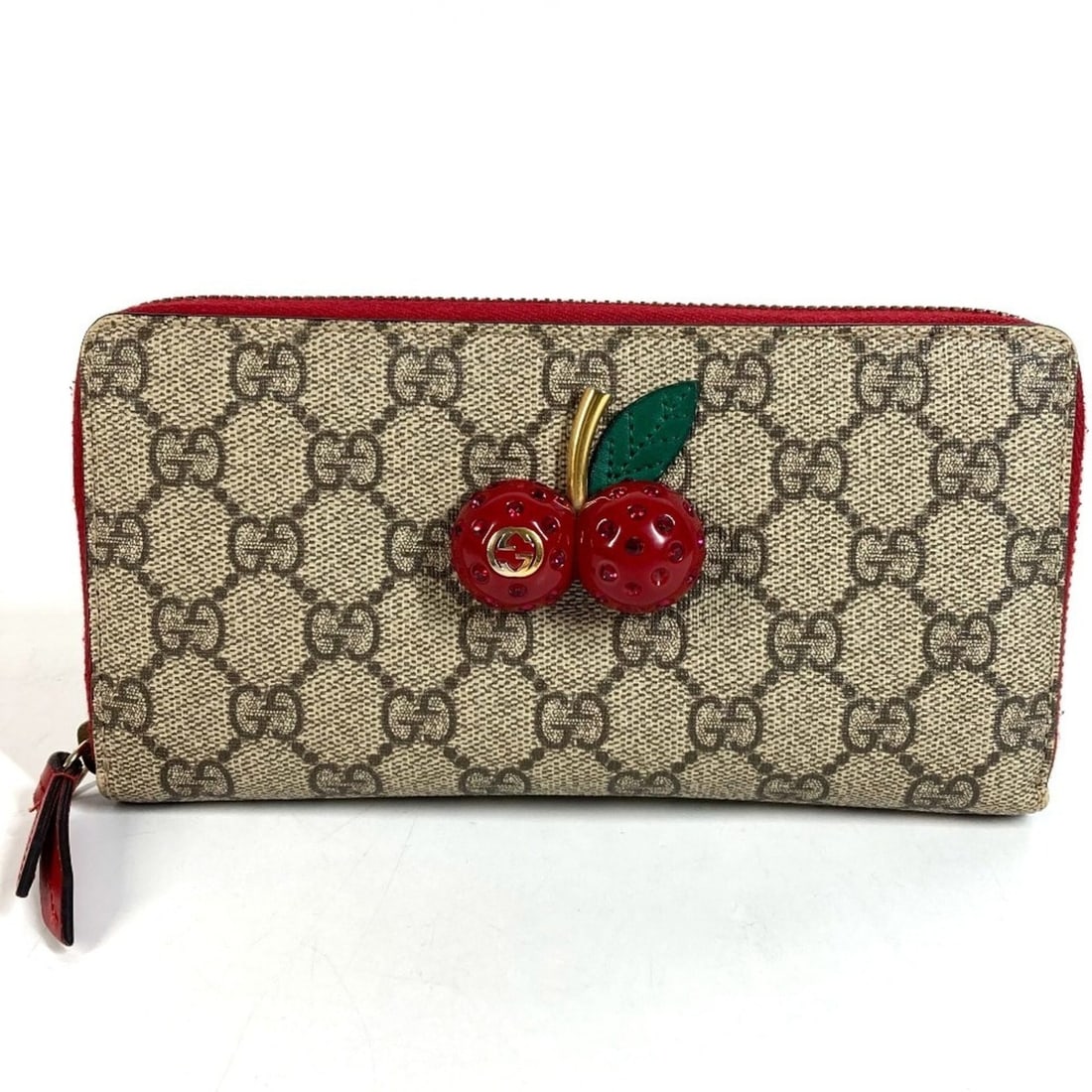 GUCCI 476049 GG Supreme Logo Cherry Rhinestone Round Zip Long Wallet, Canvas Leather, Men's/Women's,: --- Catalog ---Category: SizeSize (HxWxD): 9.5cm x 19cm / 3.74'' x 7.48''Category: DesignType: Long wallet (bi-fold)Color: Beige, Red colorGender: Men,Women,UnisexMaterial: GG Supreme , Leather Catego