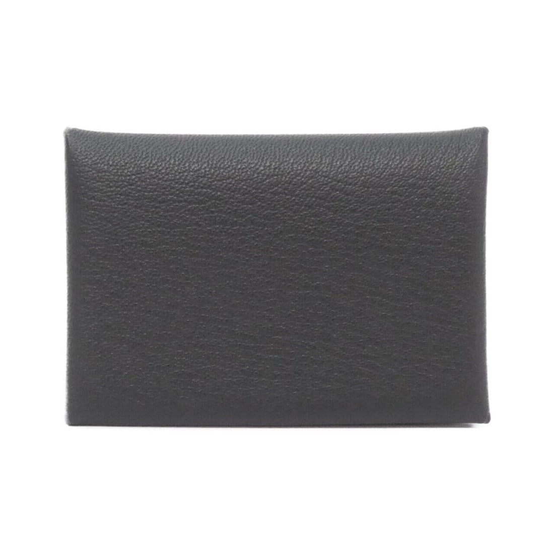 Hermes Calvi Duo 082977CK Wallet/Coin Case: --- Catalog ---Category: SizeSize (HxWxD): 7cm x 10cm x 2cm / 2.75'' x 3.93'' x 0.78''Category: DesignType: Coin purse/coin caseColor: BlackGender: Men,WomenMaterial: Chevre leather Category: GeneralB