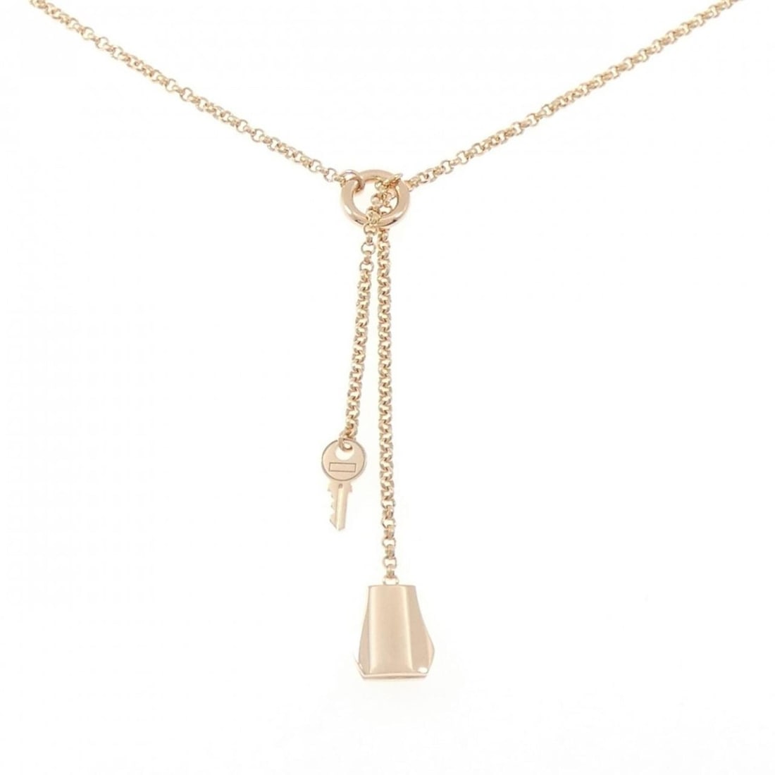 Hermes Kelly Clochette PM Necklace: --- Catalog ---Category: SizePendant Size: 63mm x 9.4mm / 2.48'' x 0.37''Neck Circumference: 40 cm / 15.74''Category: DesignGender: WomenMaterial: Pink gold (18K)Pendant Type: PendantNecklace Type: