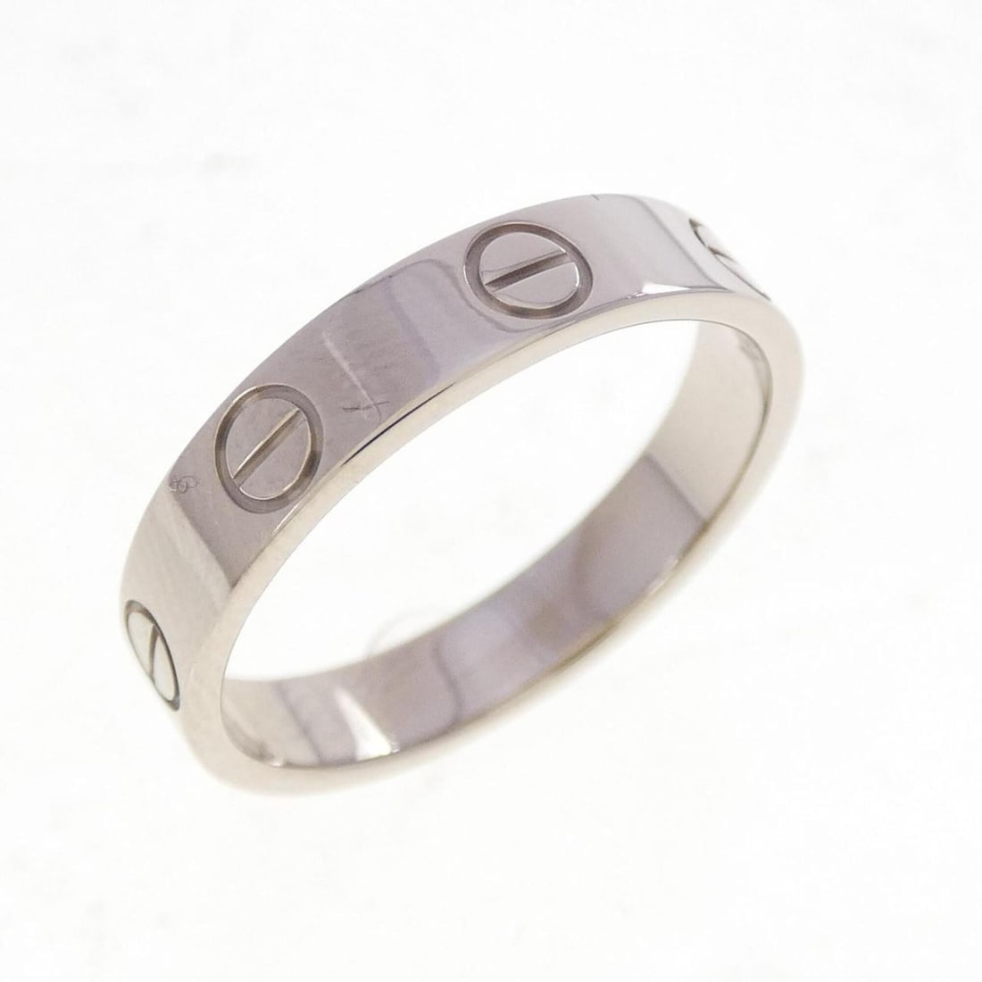 Cartier Mini Love Ring: --- Catalog ---Category: SizeJP Size: 11US Size: 6Category: DesignColor: White goldGender: WomenMaterial: White gold (18K)Category: GeneralBrand: Cartier--- Item List ---Section: ConditionRanking: