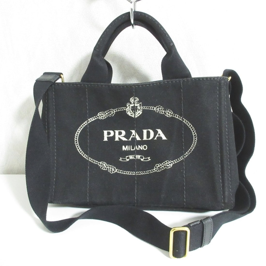 PRADA Canapa Canvas 2-way Tote Bag/Shoulder Bag B2439G Black Women's: --- Catalog ---Category: SizeSize (HxWxD): 18cm x 28cm x 13cm / 7.08'' x 11.02'' x 5.11''Strap Length: 72cm - 124cm / 28.34'' - 48.81''Handle Length: 26cm / 10.23''Category: DesignType: Shoulder bag,