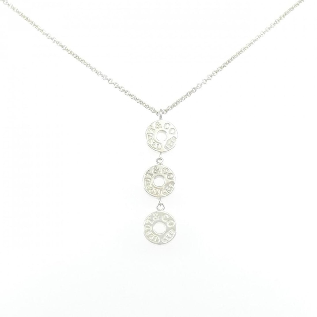 Tiffany & Co. 1837 Circle Triple Necklace: --- Catalog ---Category: SizePendant Size: 37.3mm x 9mm / 1.46'' x 0.35''Neck Circumference: 41 cm / 16.14''Category: DesignGender: WomenMaterial: Silver 925Pendant Type: PendantNecklace Type: